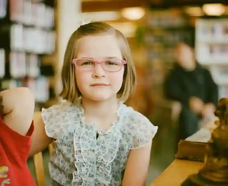 kid wearing glasses